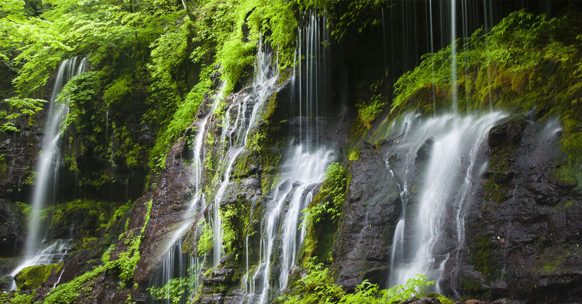 waterfalls in green mountains